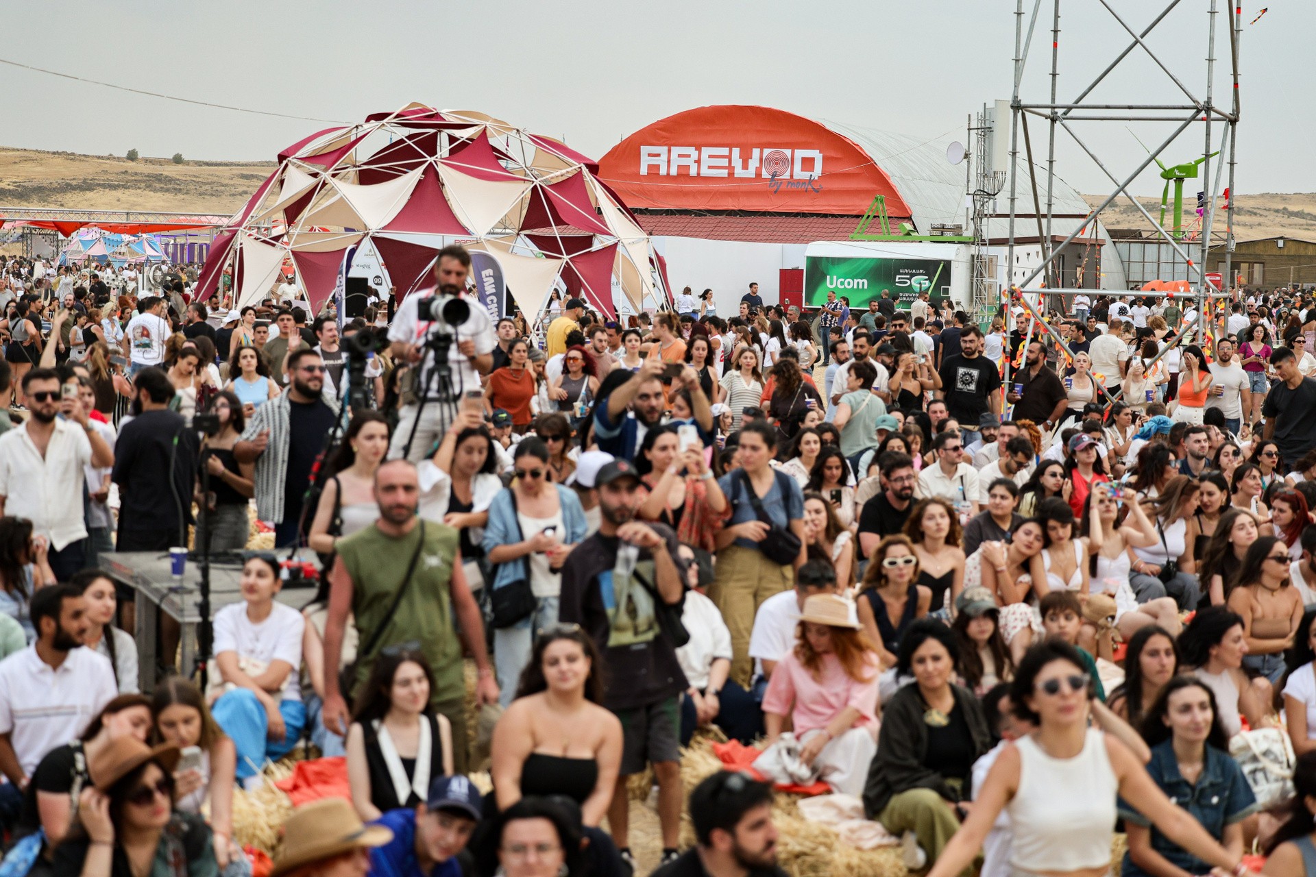 Aerial daytime view of the crowd and AREVOD dome entrance