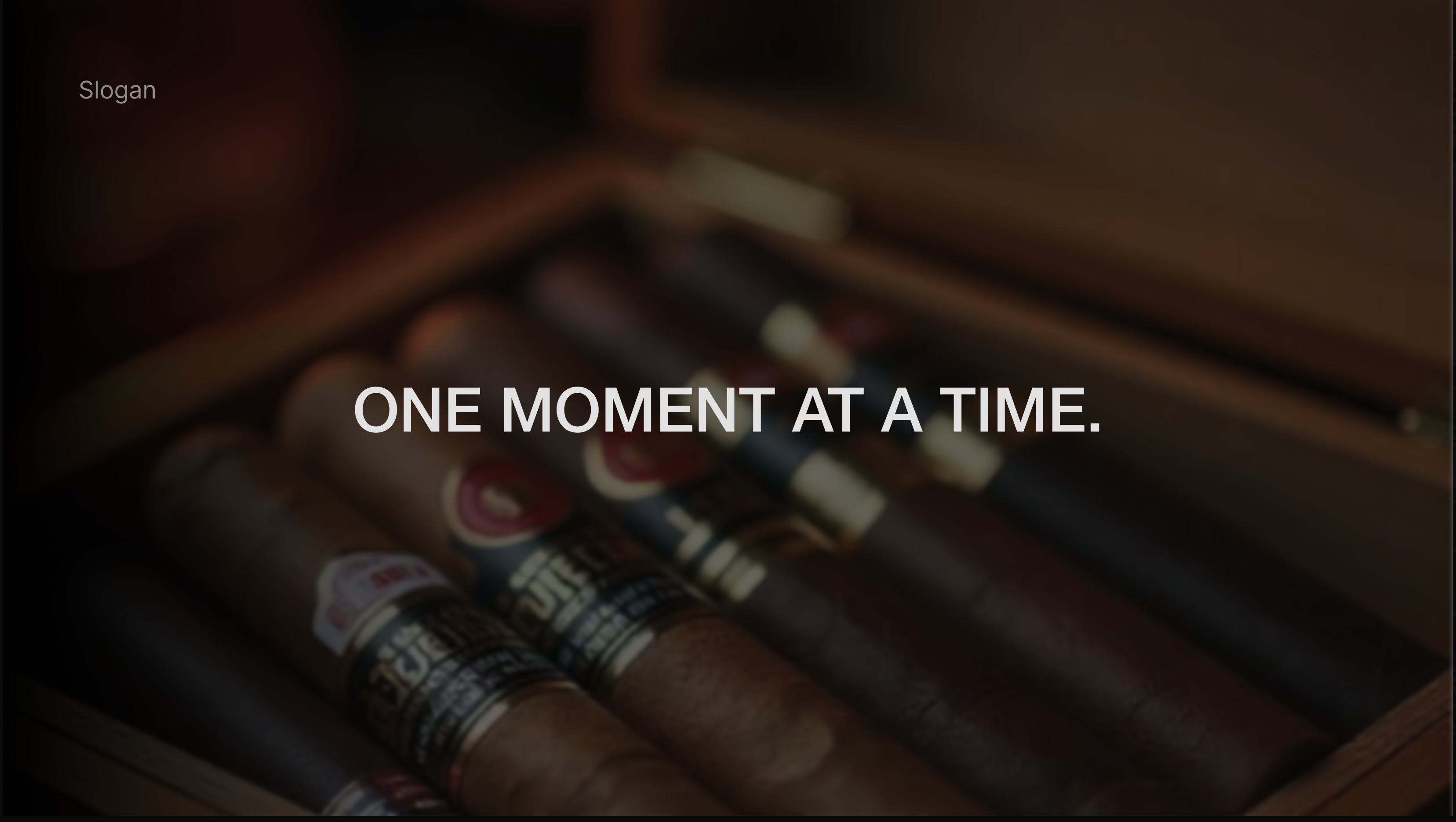 Chaac tagline 'One moment at a time' over an open cigar humidor