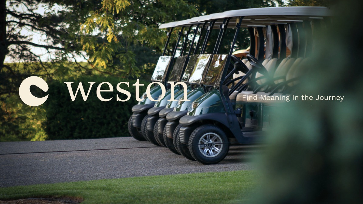 Weston wordmark over a row of golf carts at the club